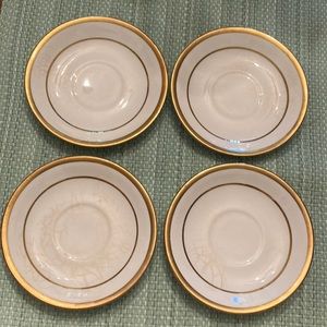 18K Gold rimmed Homer Laughlin edged saucers. Antique dishes5”diameter.